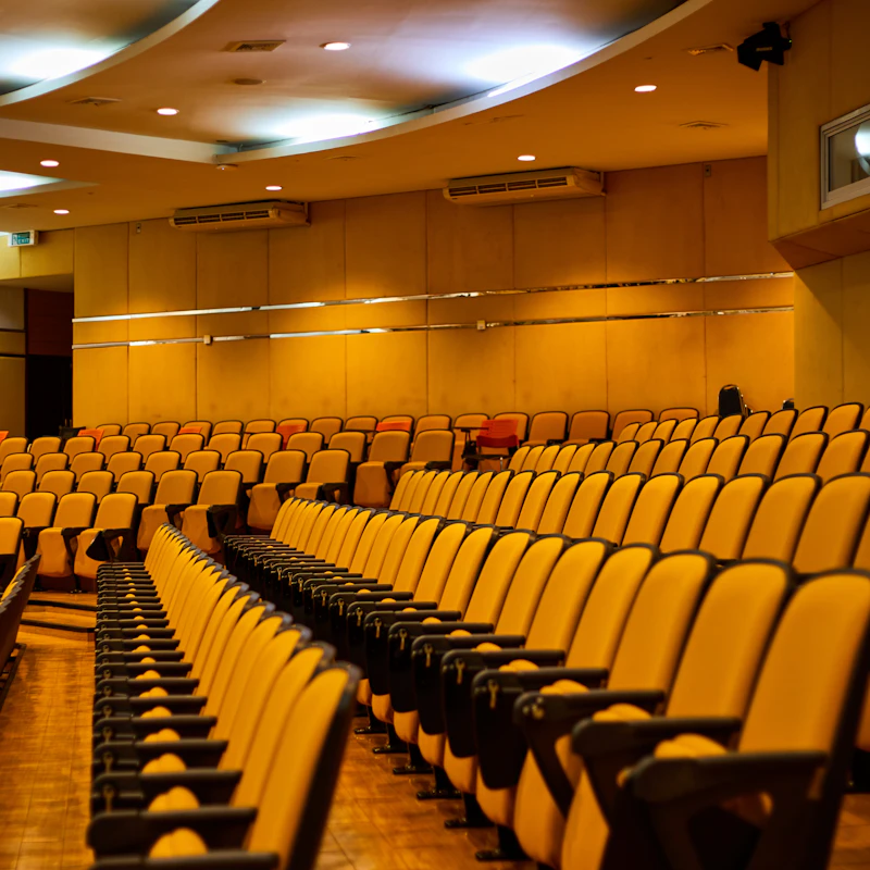 Rows of seats in an empty auditorium