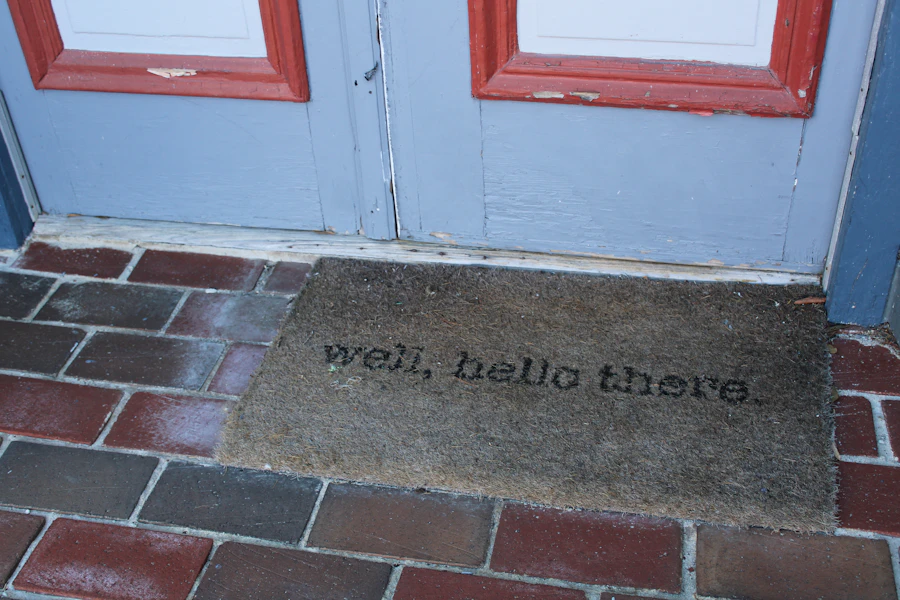 A welcome mat at a doorway