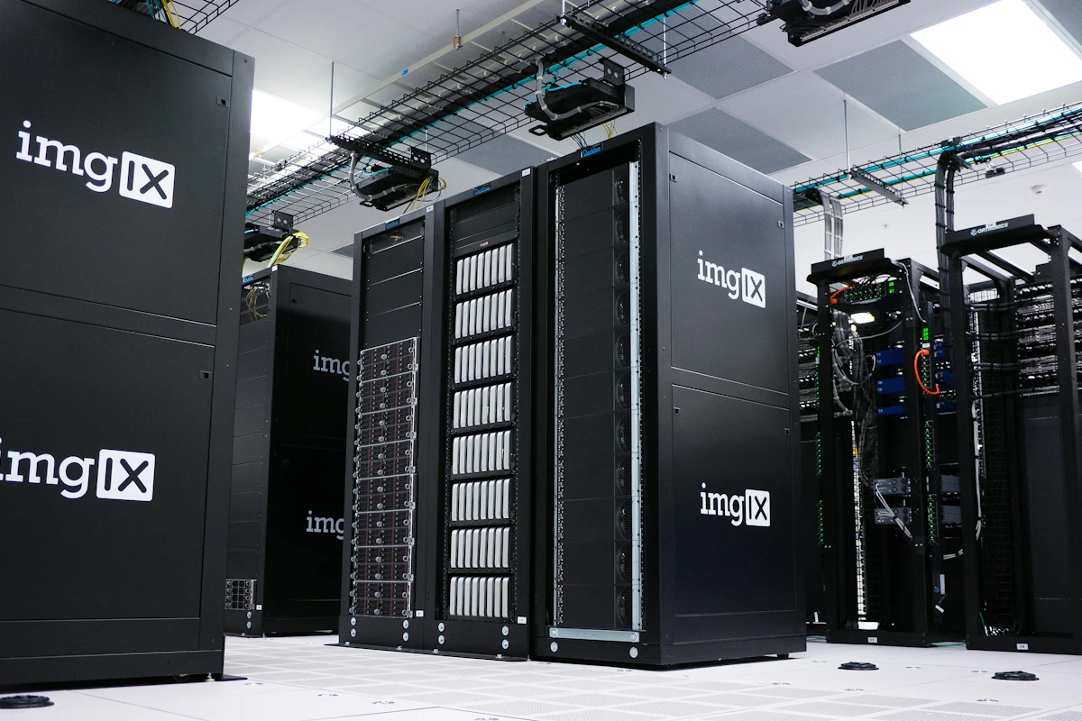 Server racks in a data center, illustrating the infrastructure behind a Data Center-to-Cloud migration.