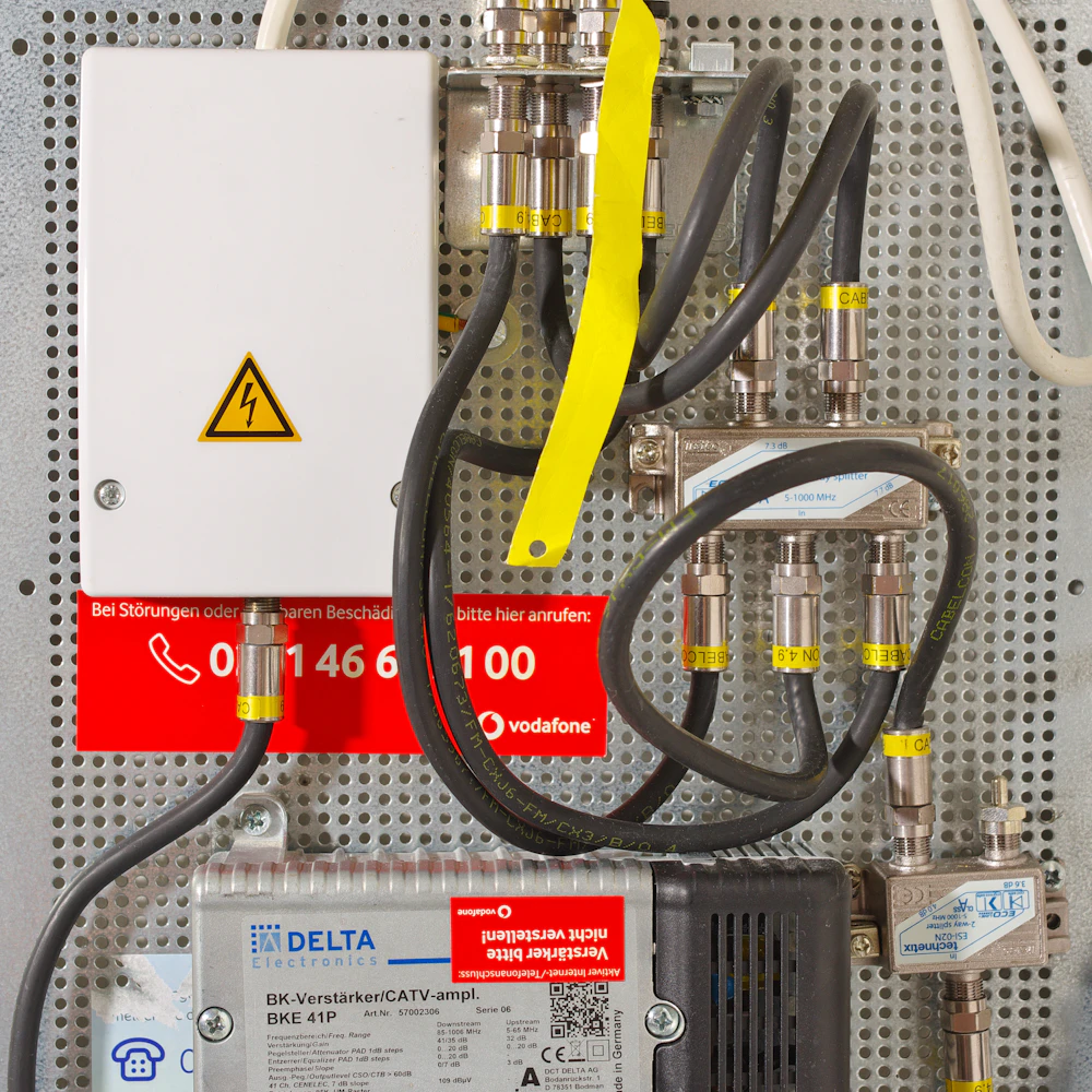 Network cables and a switch, illustrating the dependencies and complexity addressed by technology governance.