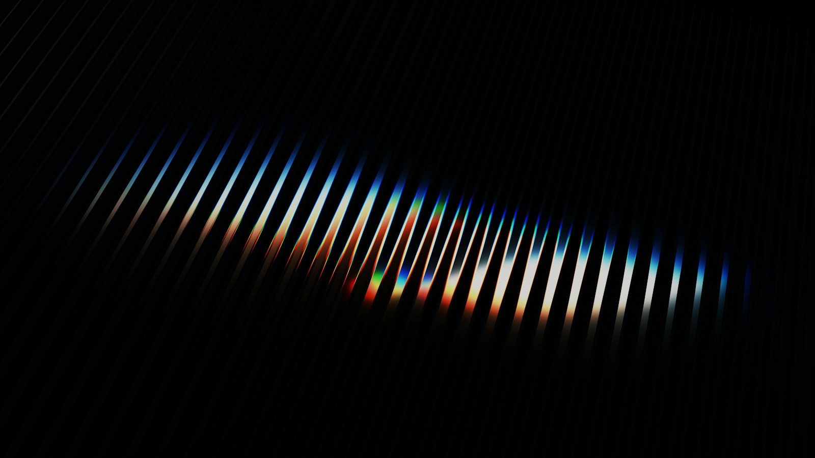 Abstract blue, green, and red light streaks on a dark background, representing connected AI systems and intelligent workflows