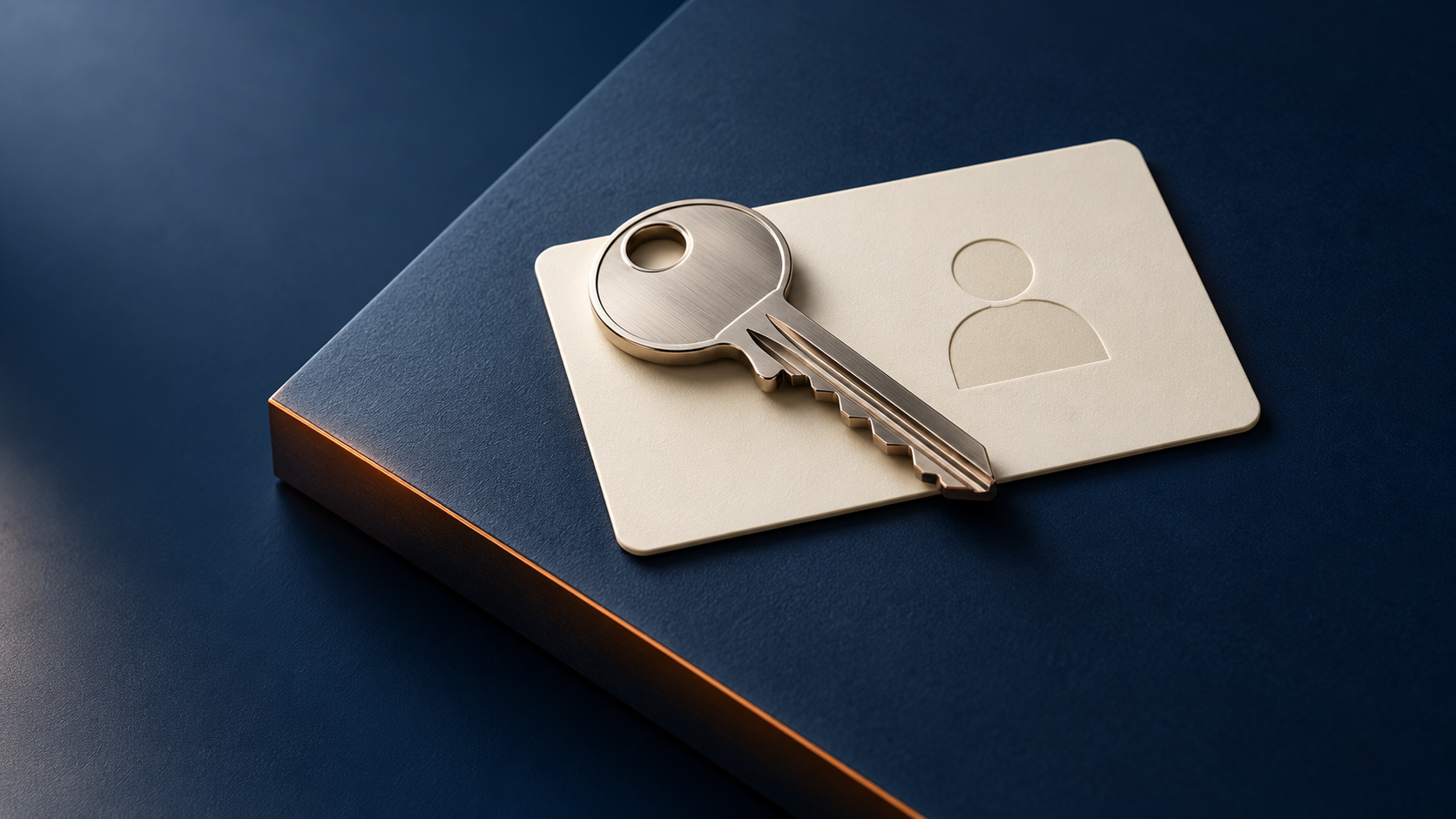 A silver key rests on a single identity card, illustrating administrator access assigned to an individual.