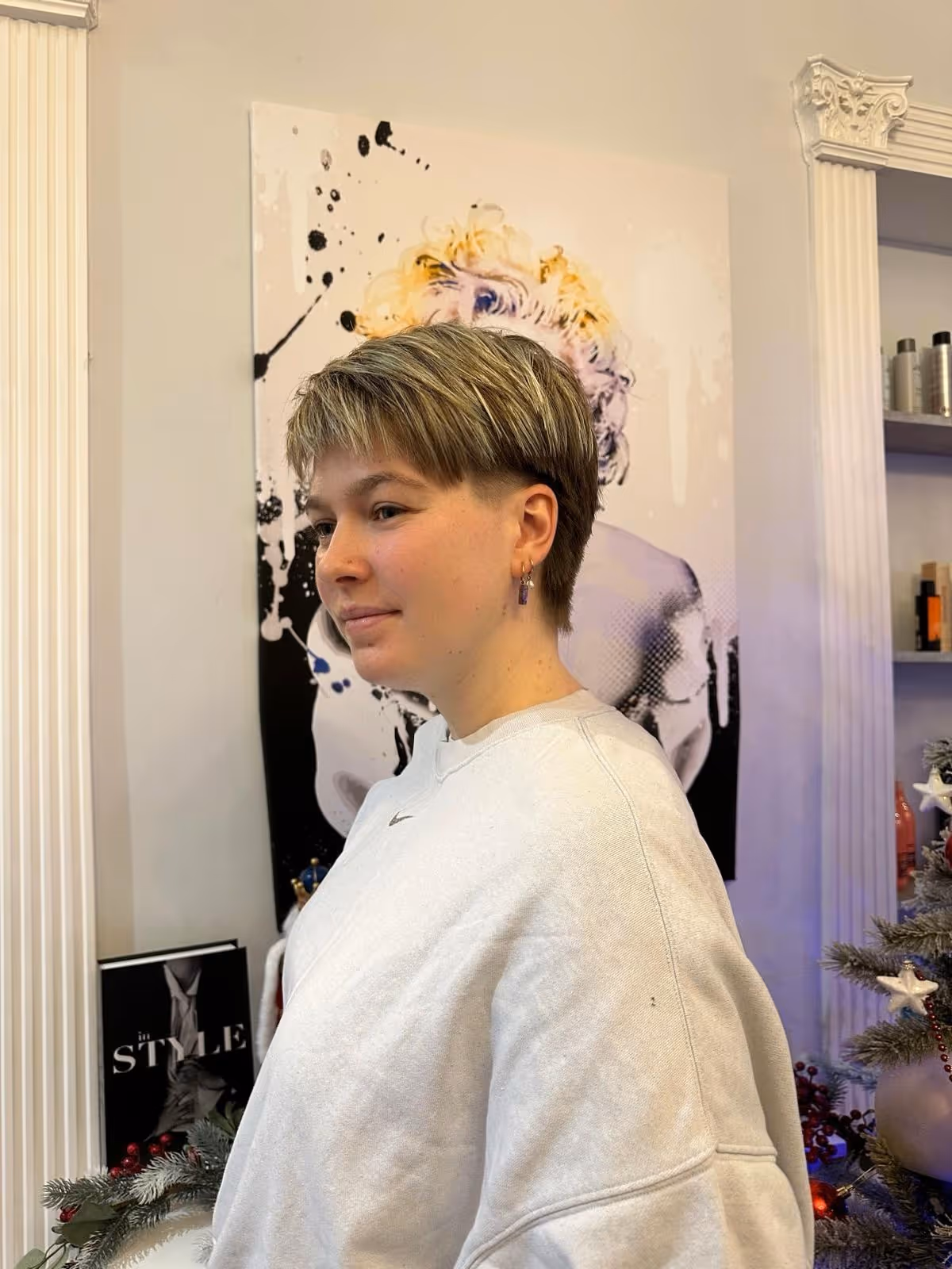 Back view of long light brown hair styled in soft waves.