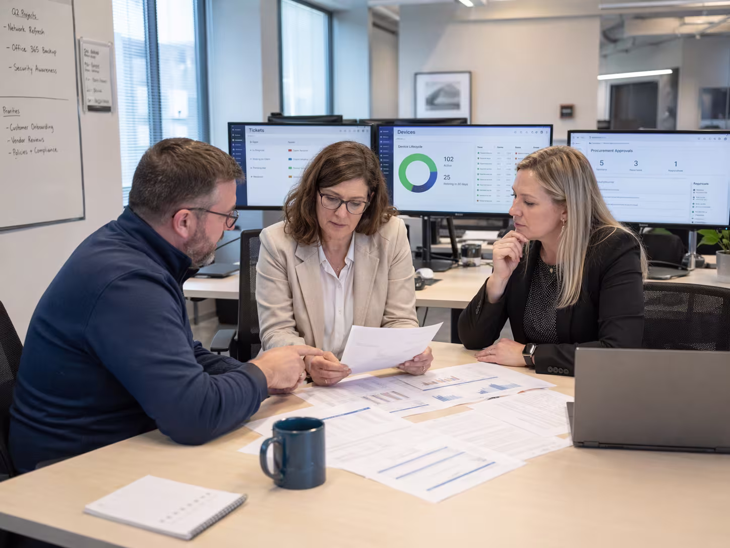 Diverse team discussing IT procurement solutions