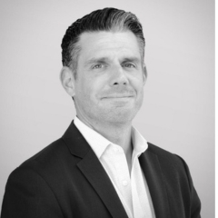 Portrait of Mike Neligan, former CMO at VaynerSports.