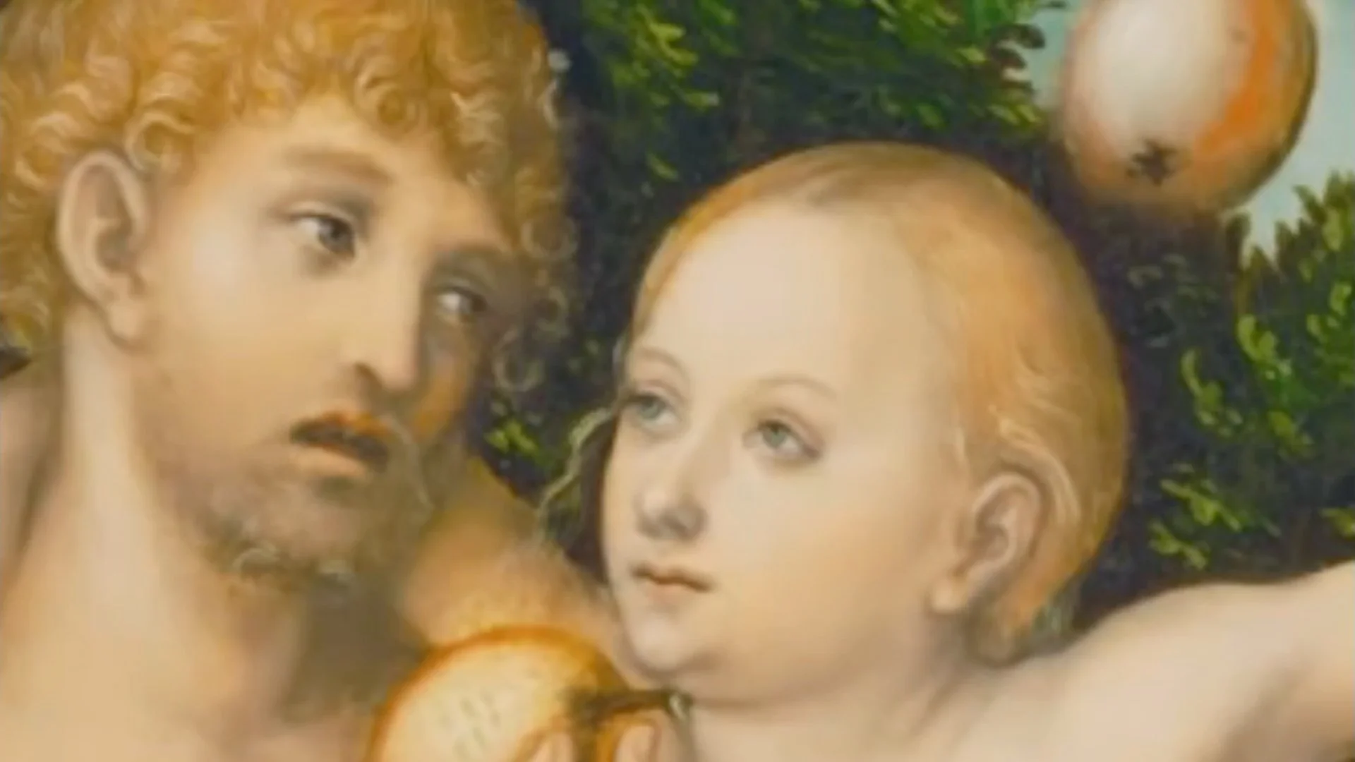 Close-up of two figures from a classical painting, a man with curly hair and beard looking at a child holding a piece of fruit with pomegranate in the background.
