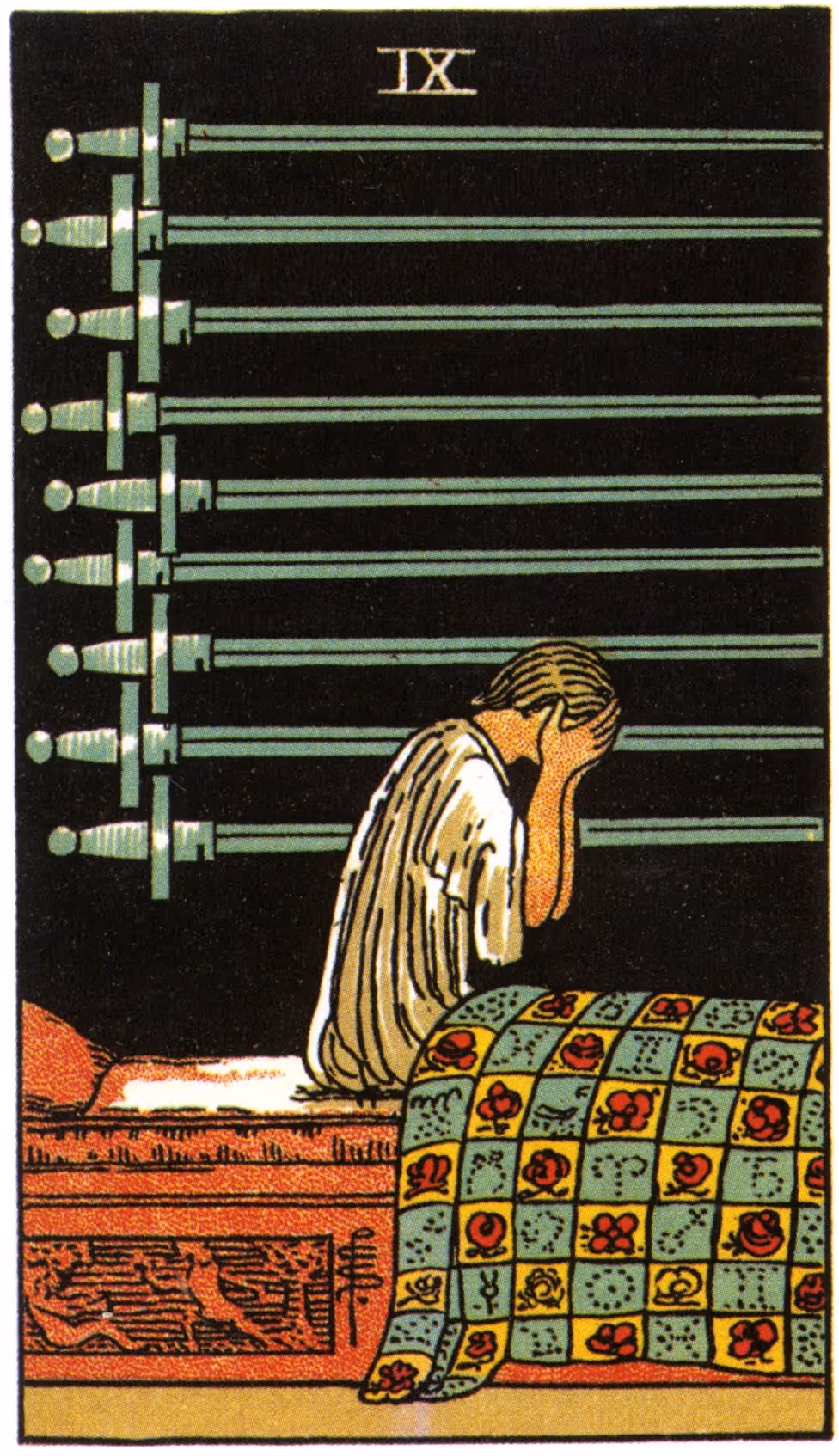 The Nine of Swords tarot card from the Rider deck