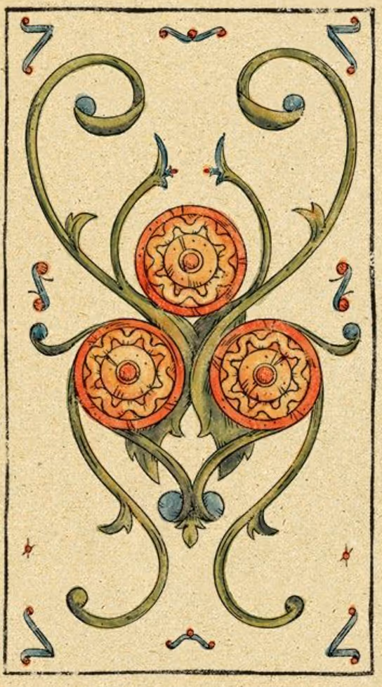 The Three of Disks tarot card, Marseille deck: two disks being surmounted by a third.