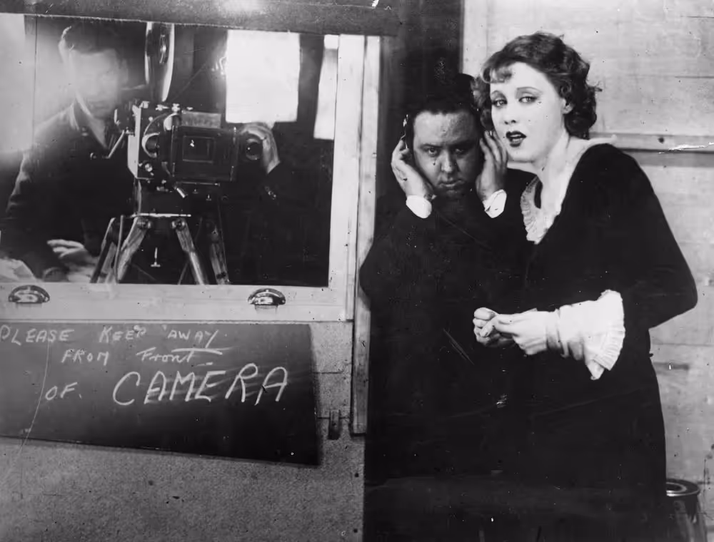 Alfred Hitchcock and Anny Ondra during the filming of Blackmail, 1929.
