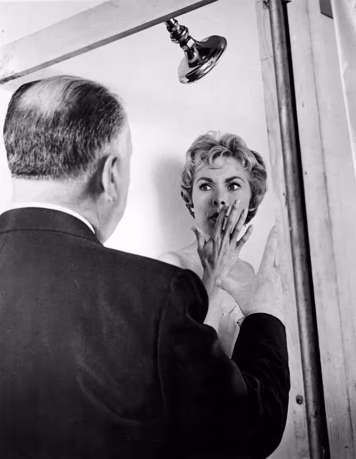 Hitchcock directing Janet Leigh during the filming of Psycho, 1960.