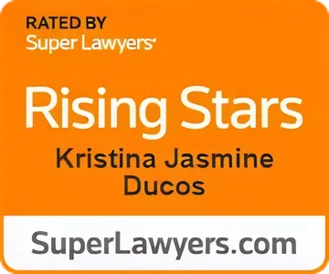 Orange badge rating Kristina Jasmine Ducos as a Rising Star by Super Lawyers with website SuperLawyers.com.