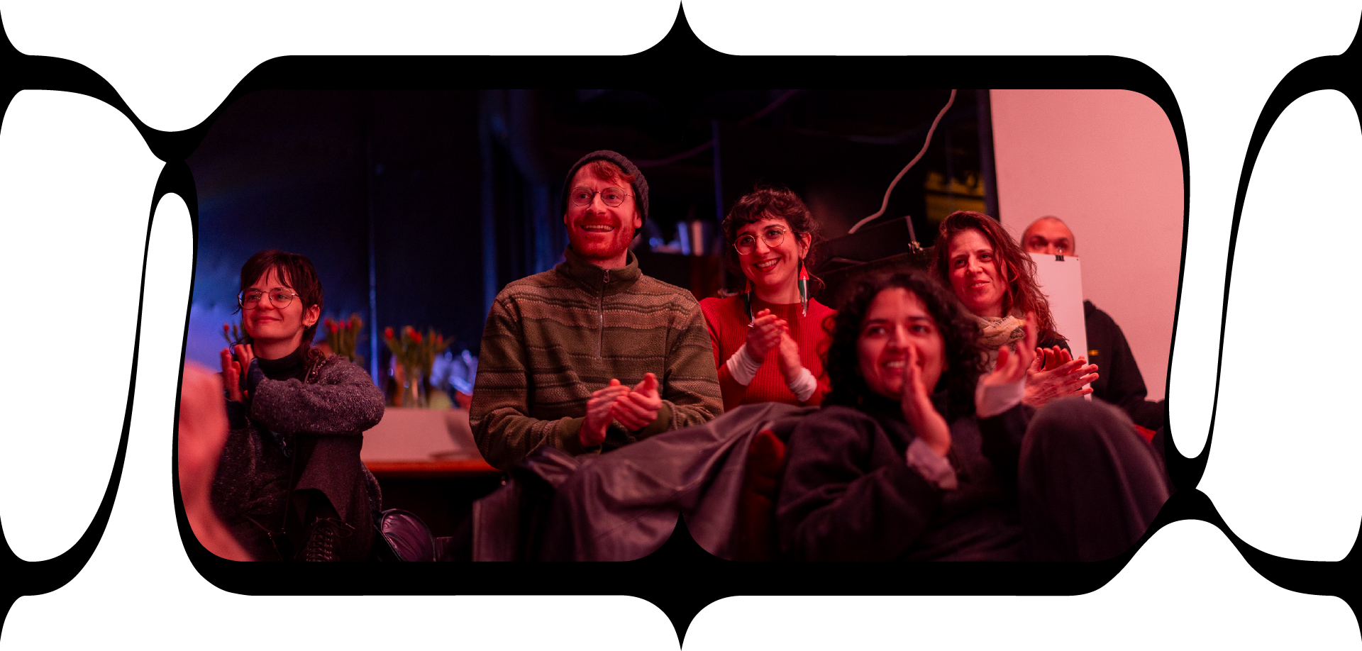 Audience members clap at tendermesh film festival, Studio DB, Berlin