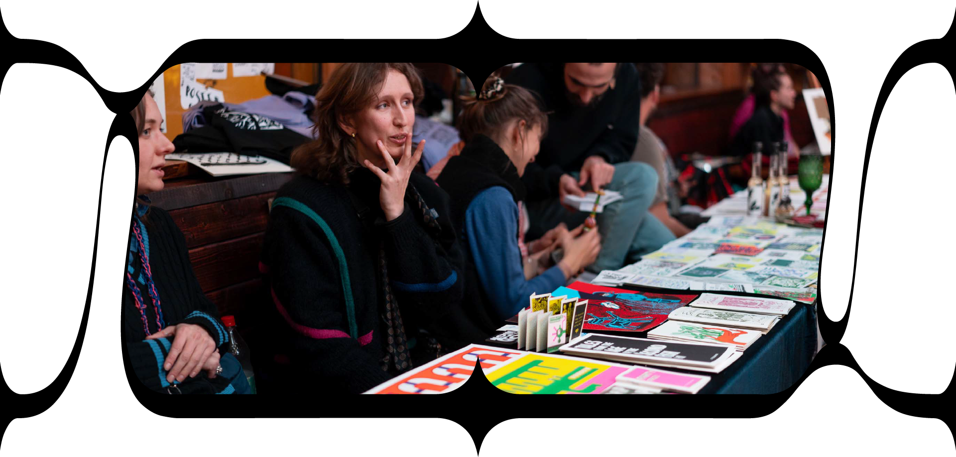 Vendor selling prints at art market