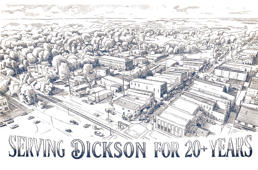 Aerial view of a town with text 'Serving Dickson for 20+ years' at the bottom.