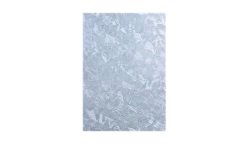 Close-up of frozen ice crystals forming a textured pattern on a surface.