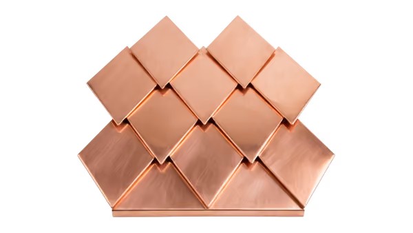 Stack of copper-colored metallic diamond-shaped tiles arranged in overlapping rows.