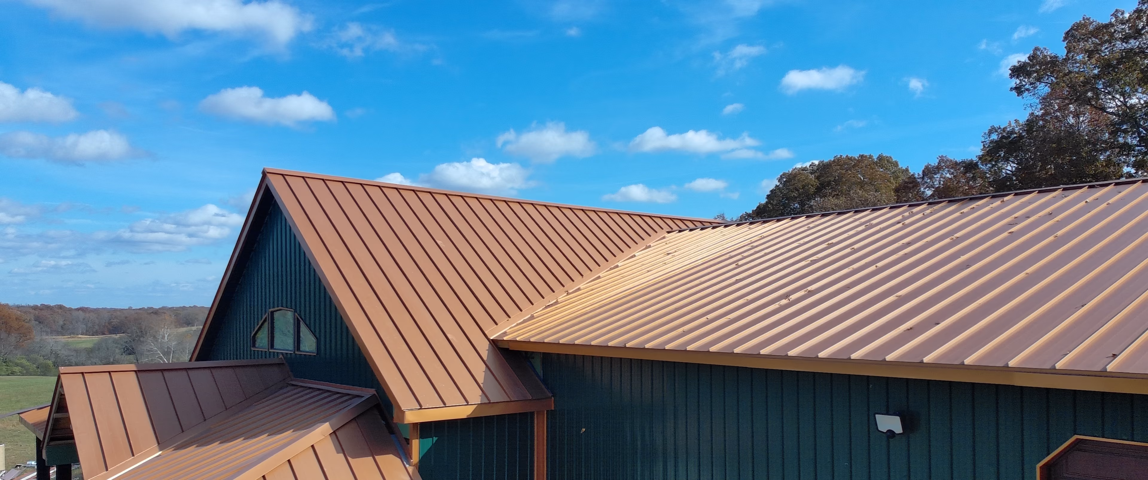 Aerial drone view of a metal roofing project by The Metal Roofers in Middle Tennessee