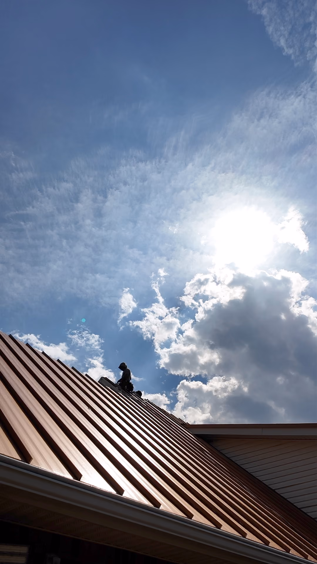 The Metal Roofers crew installing a standing seam metal roof in Middle Tennessee