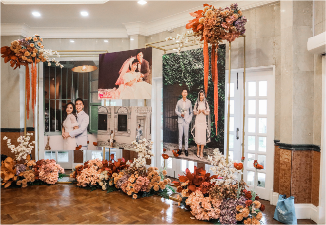 An indoor wedding reception at Whitehouse @ The Estate on Federal Hill, showcasing the hall-style dinner setup that follows a garden ceremony.