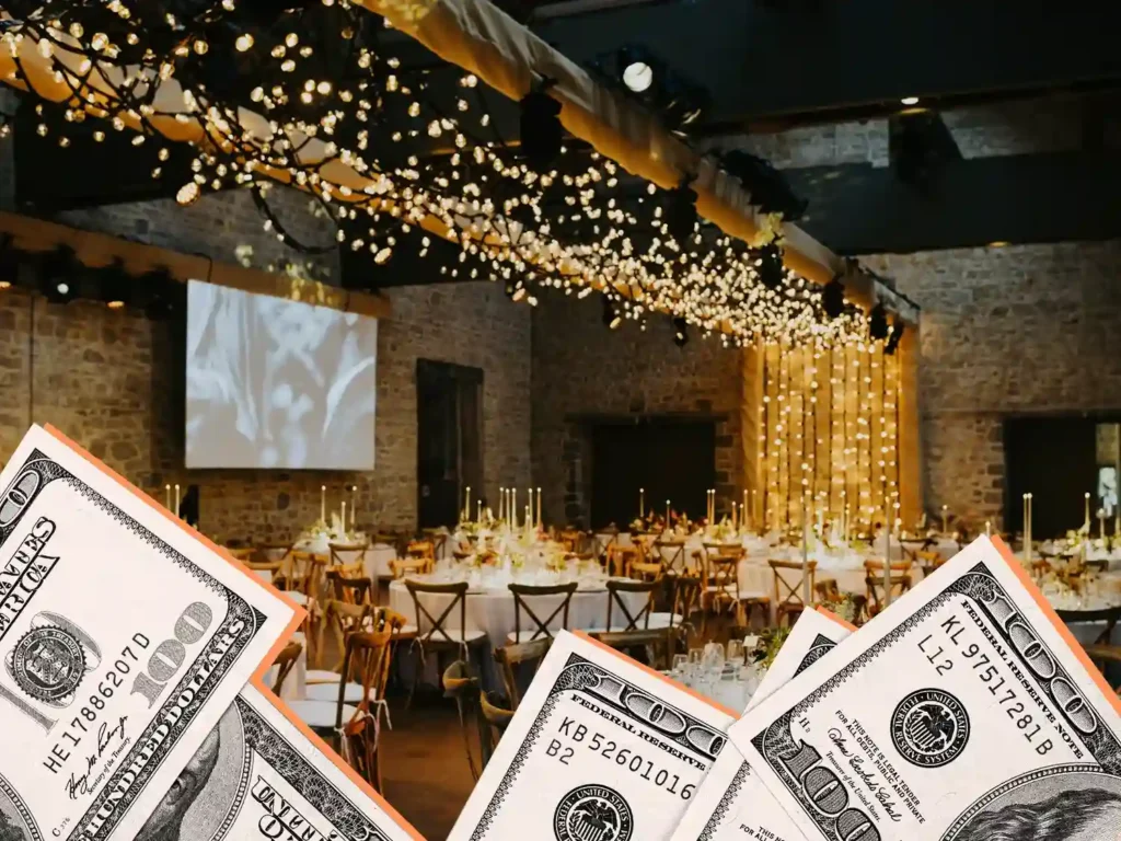 a decorated event hall overlaid , the money around means the cost of the venue.
