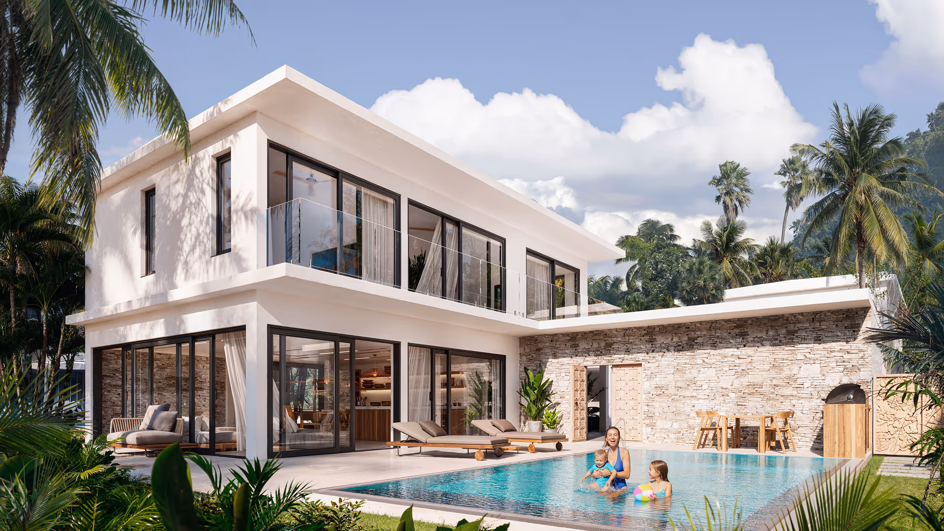 Modern two-story white house with large glass windows, a swimming pool with a woman and two children playing, surrounded by palm trees.