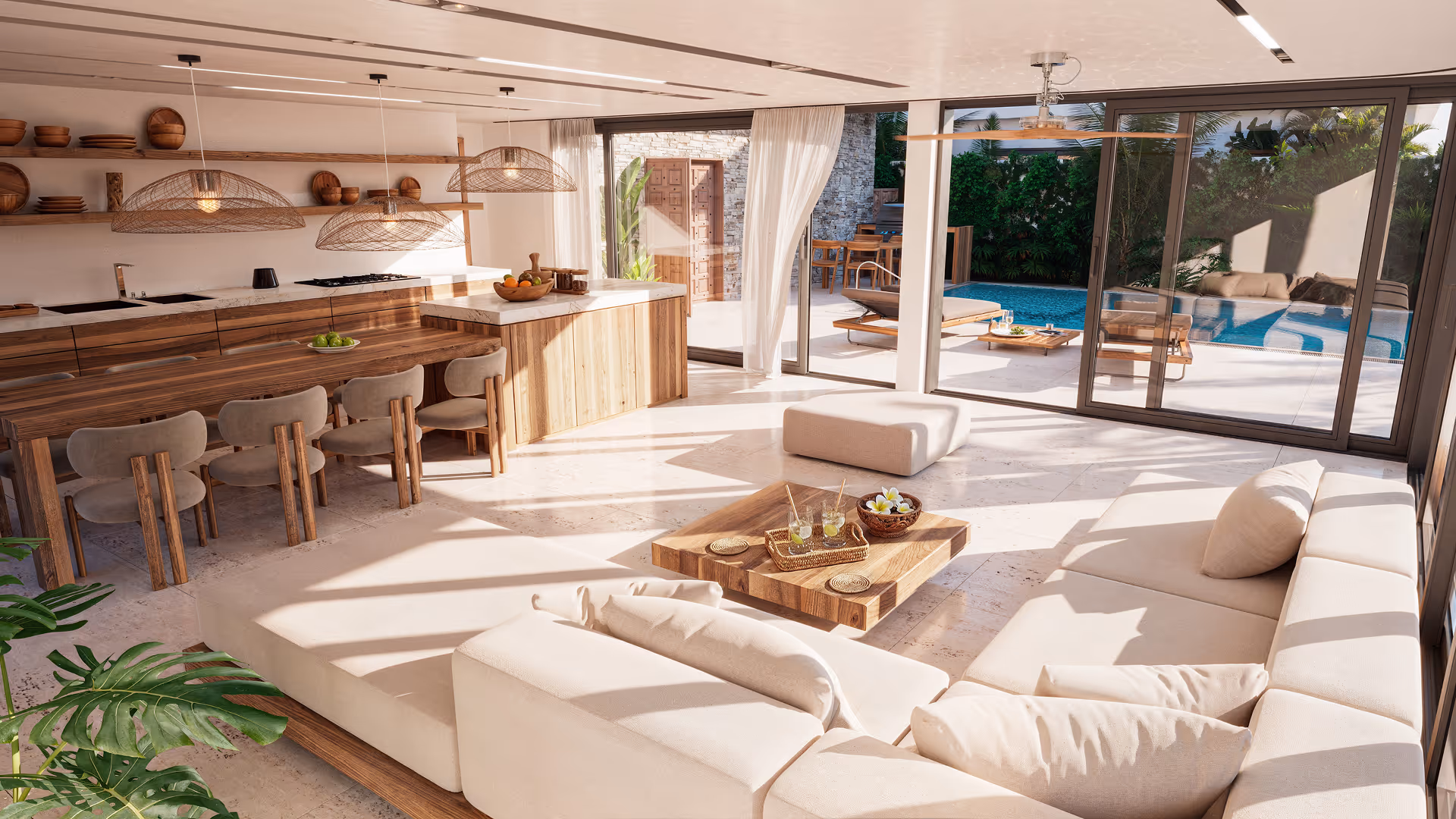 Modern open living room and kitchen with beige sectional sofa, wooden dining table, pendant lights, and large sliding glass doors opening to a pool patio.