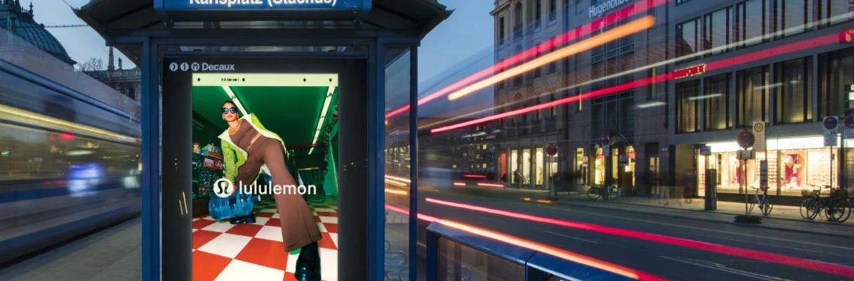 Lululemon digital out-of-home ad displayed at a transit shelter in Germany