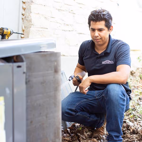 Cleaning and repairing coils on an hvac unit for better efficiency.