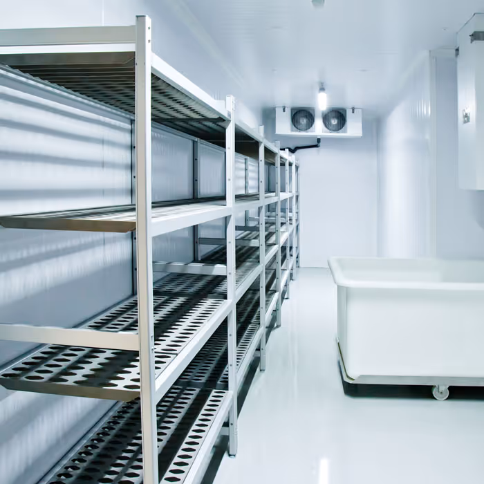 Commercial hvac company technician servicing large hvac units on a rooftop in San Antonio TX.