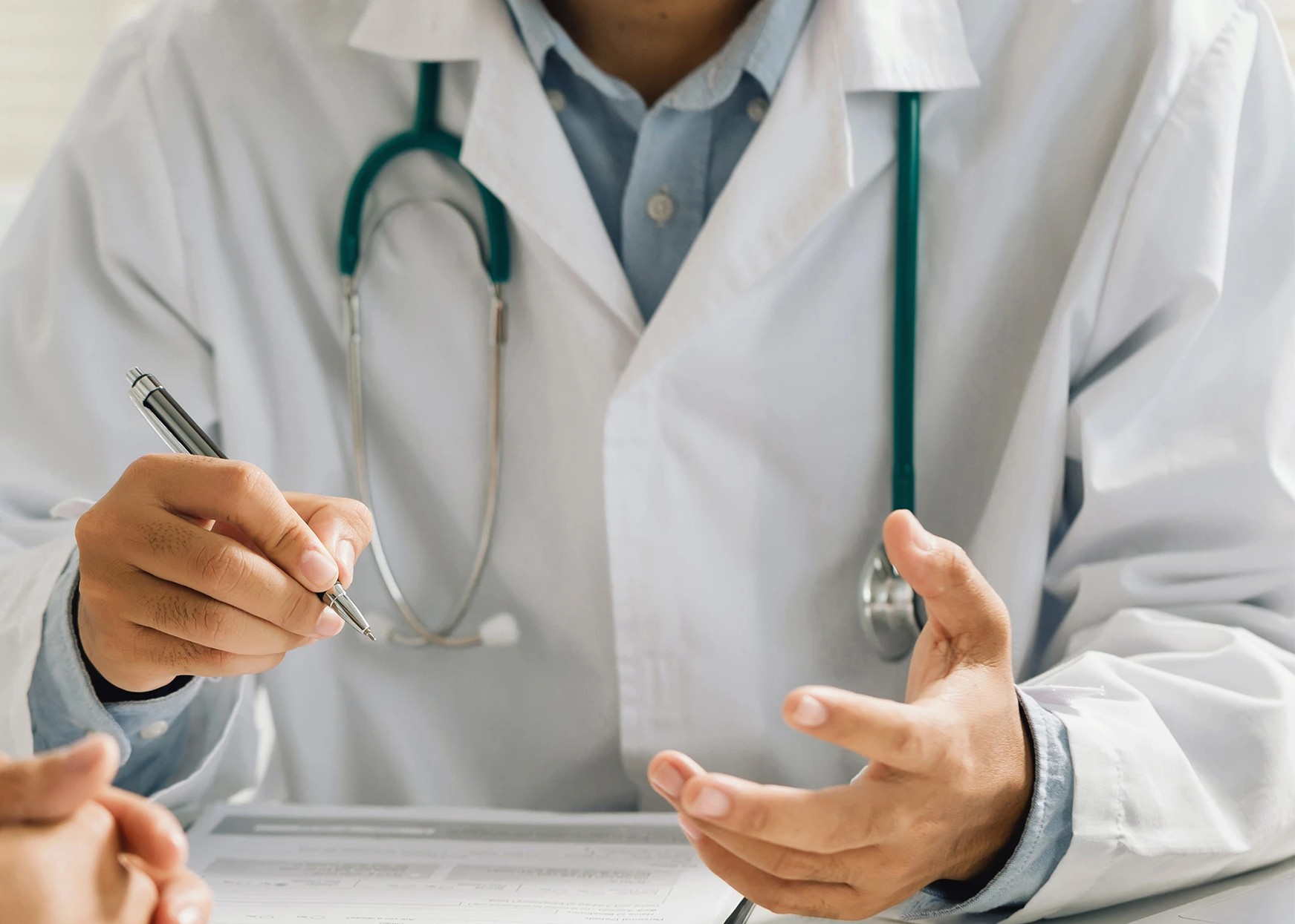 A doctor talking to a patient