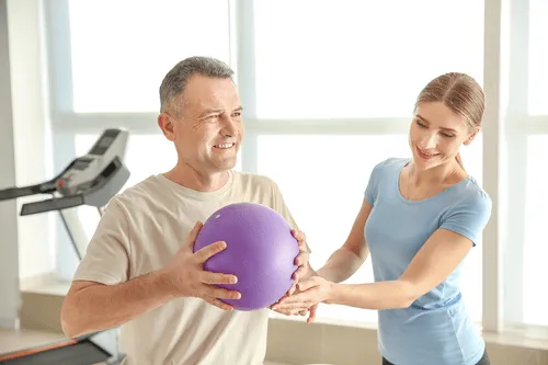 A woman and man working out