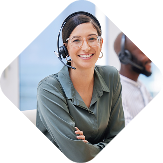 software support employee wearing headset and smiling