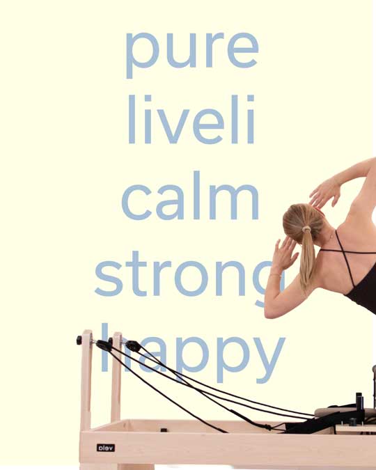Woman with blonde ponytail doing side stretch on Pilates reformer machine with motivational words behind.