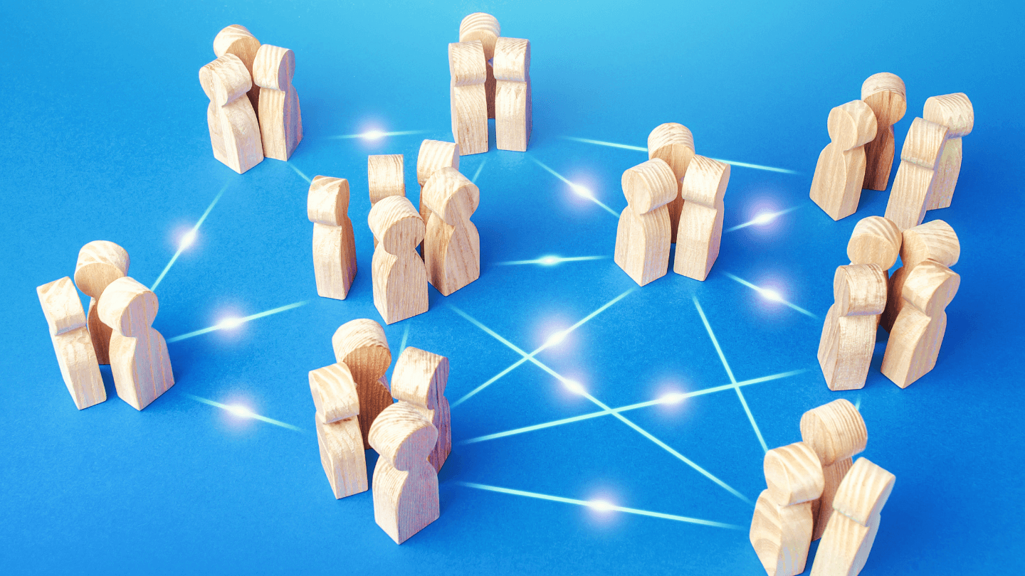 A wooden-like human figure illustrating how connection between teams work