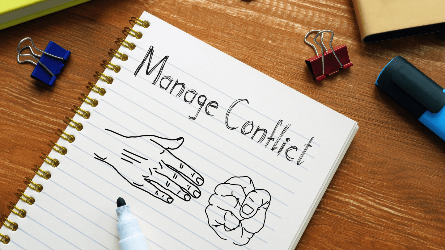 A hand drawn rock paper scissors game with text at the top saying Manage Conflict