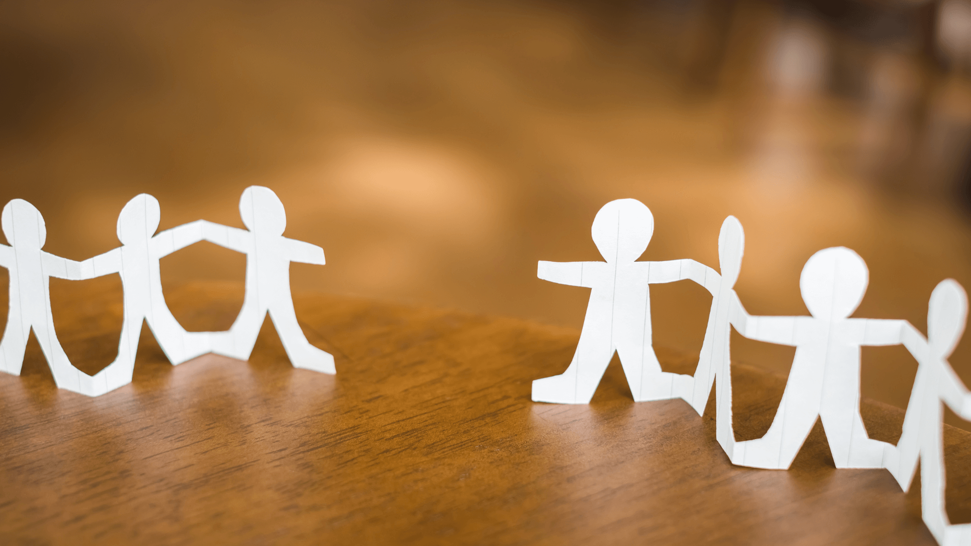 Paper cutouts with the shape of multiple person
