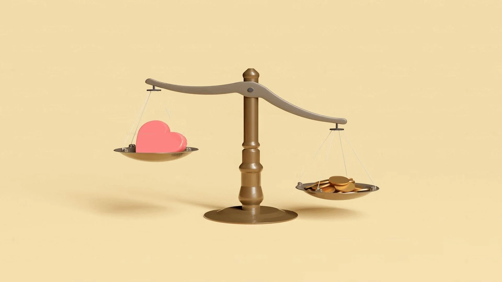 A scale weighing the value of heart or money
