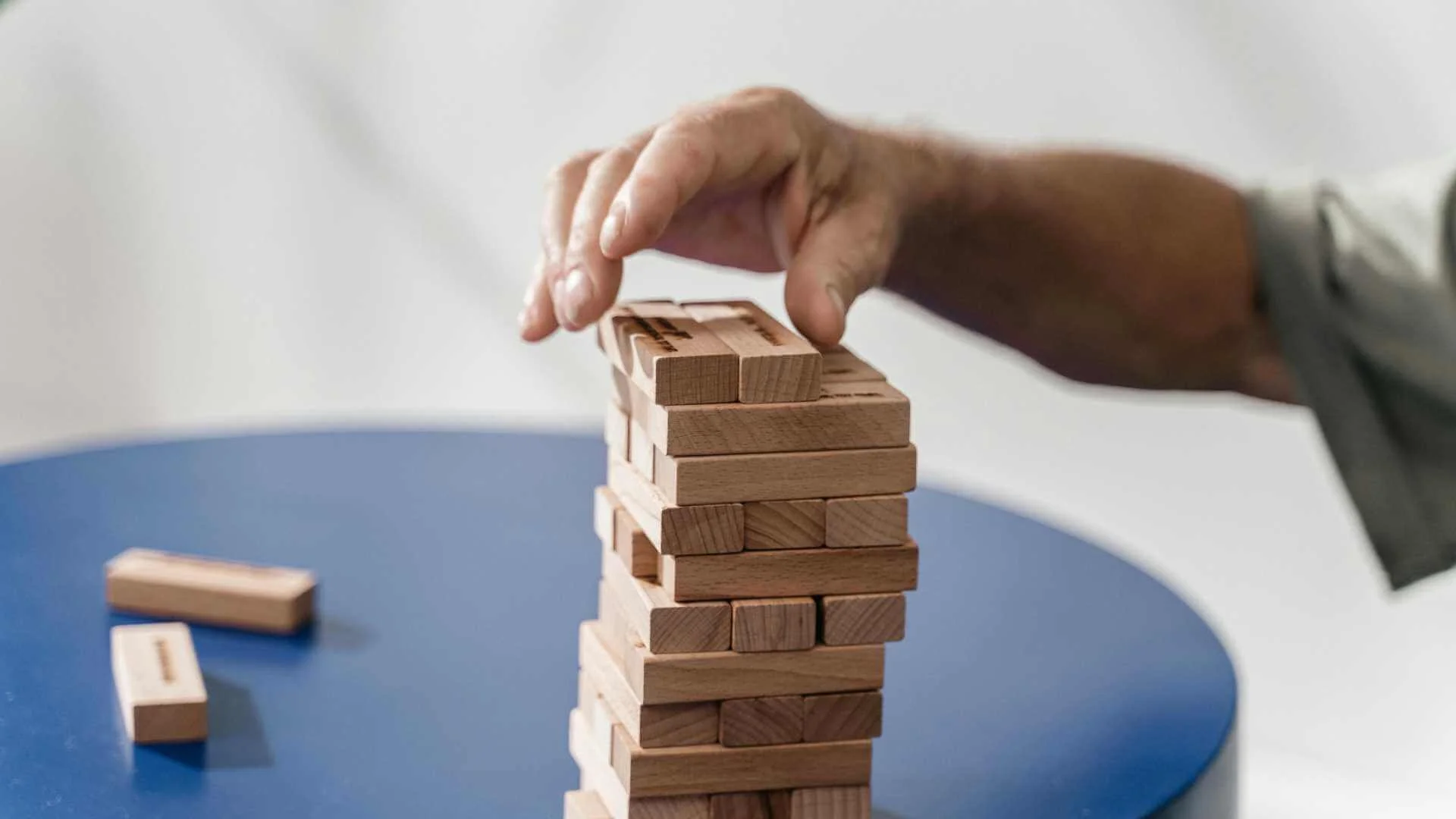 A popular game of stacking wooden tiles forming a tower