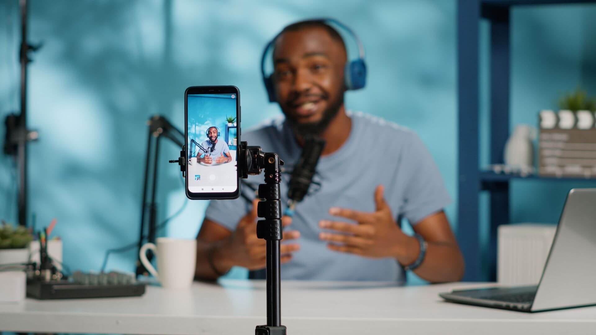 Man recording himself through a phone