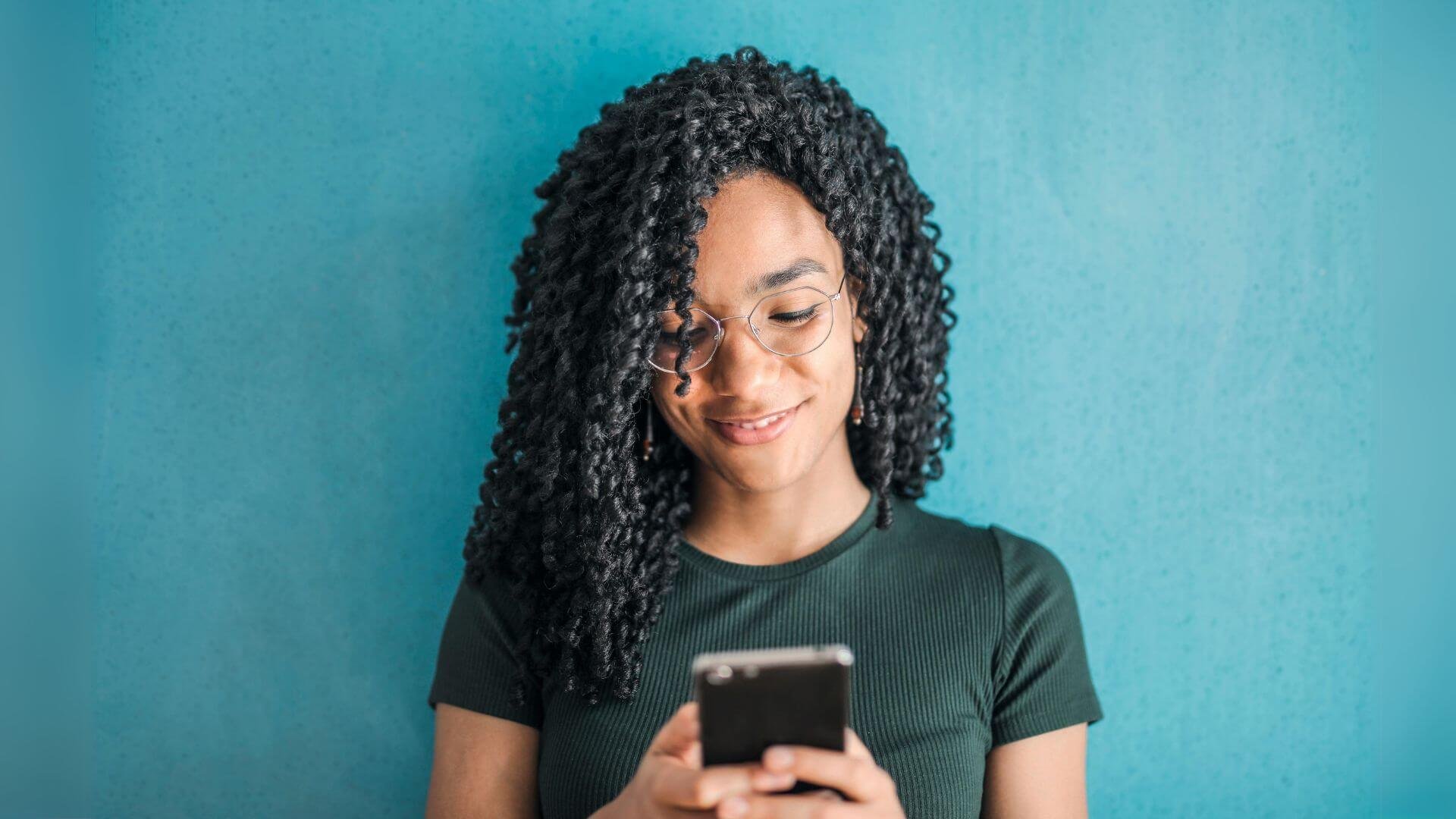 Woman browsing through her phone