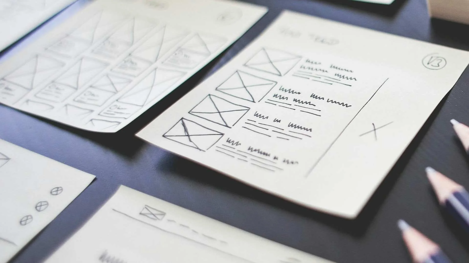 Document displaying various design layouts for user interfaces.