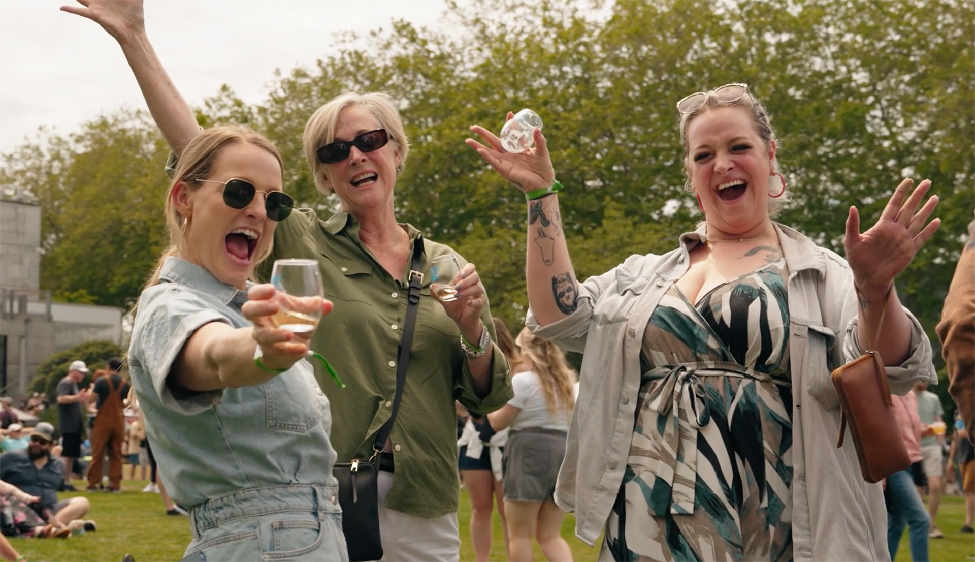 Three attendees cheering at Washington Brewers Fest 2026