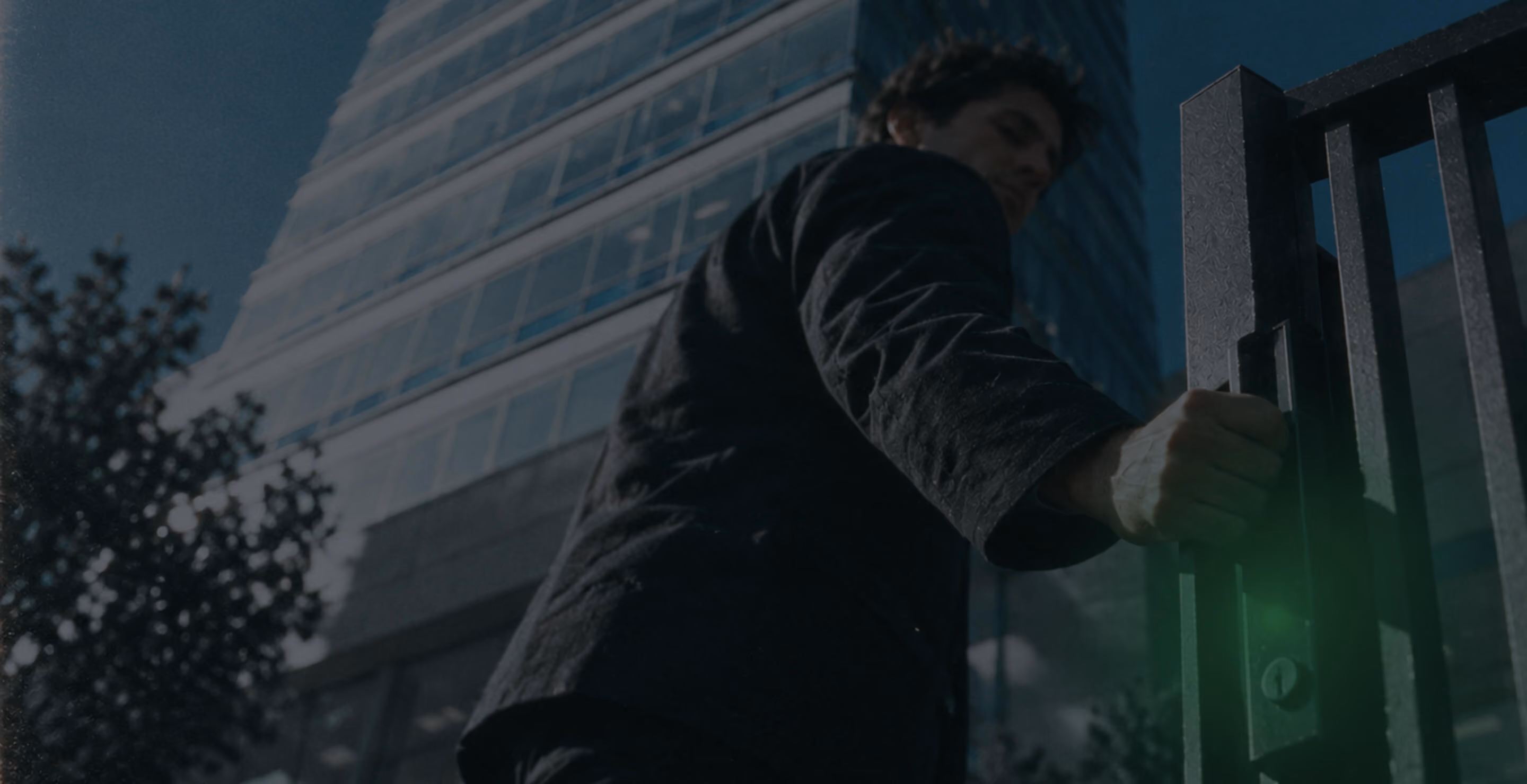 Person unlocking a secured gate, symbolizing sovereign data protection with DNA Shield