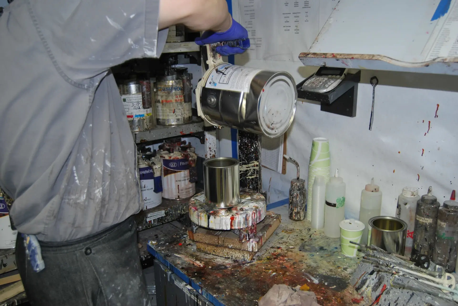 paint going into small container showroom