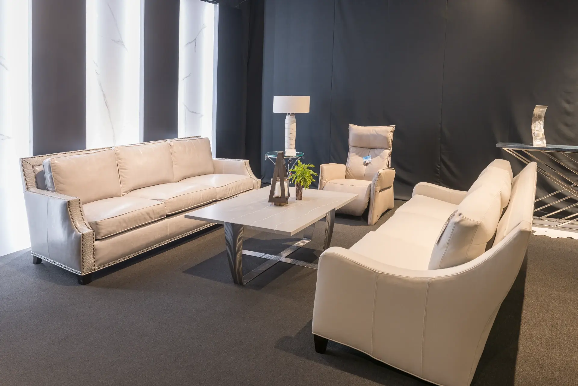 HF_LeatherShowroom_couches and a chair