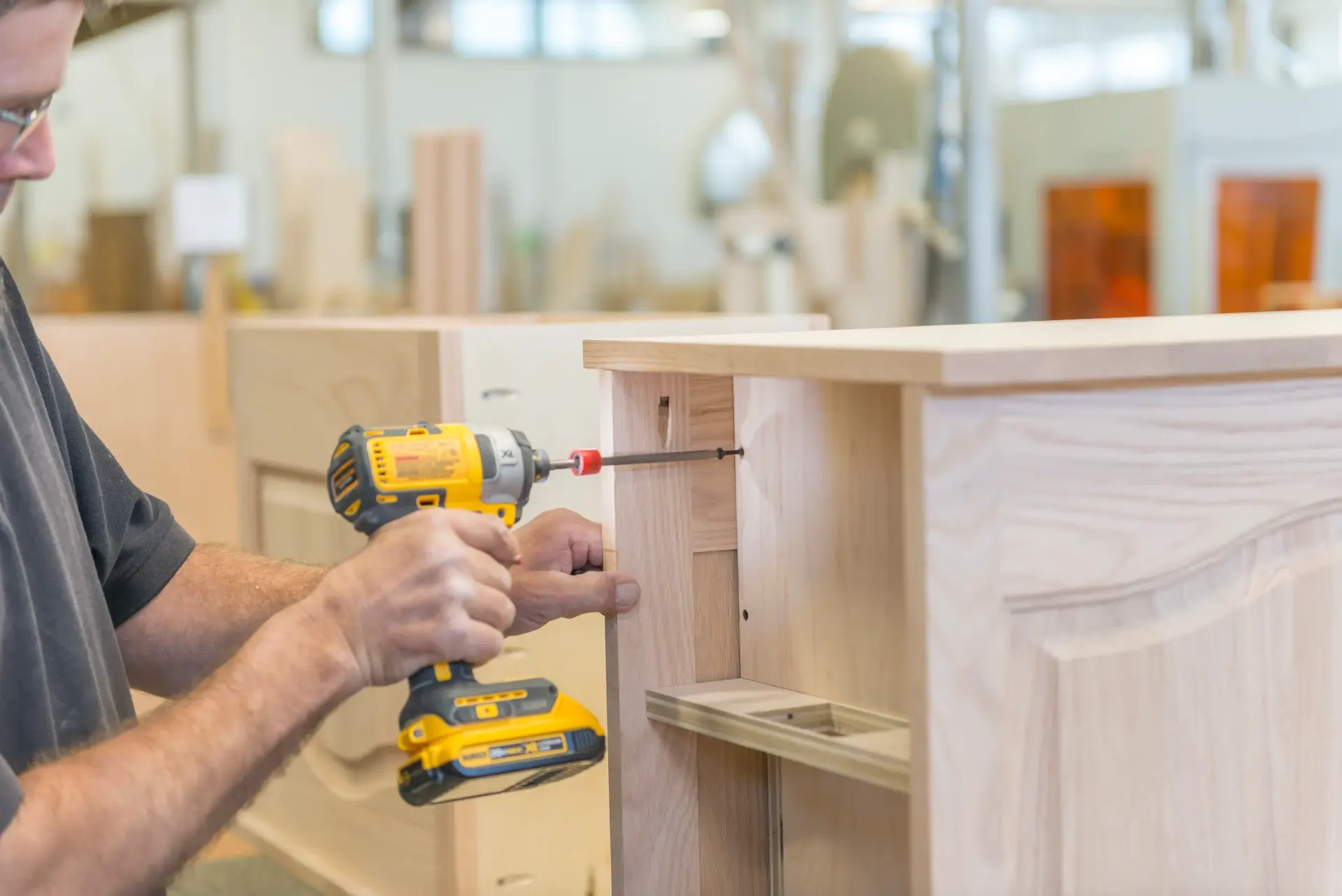 homestead factory worker drilling wood