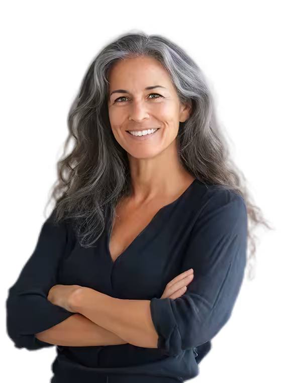 Smiling mature woman with long gray hair, wearing a black top with sleeves rolled up and arms crossed.
