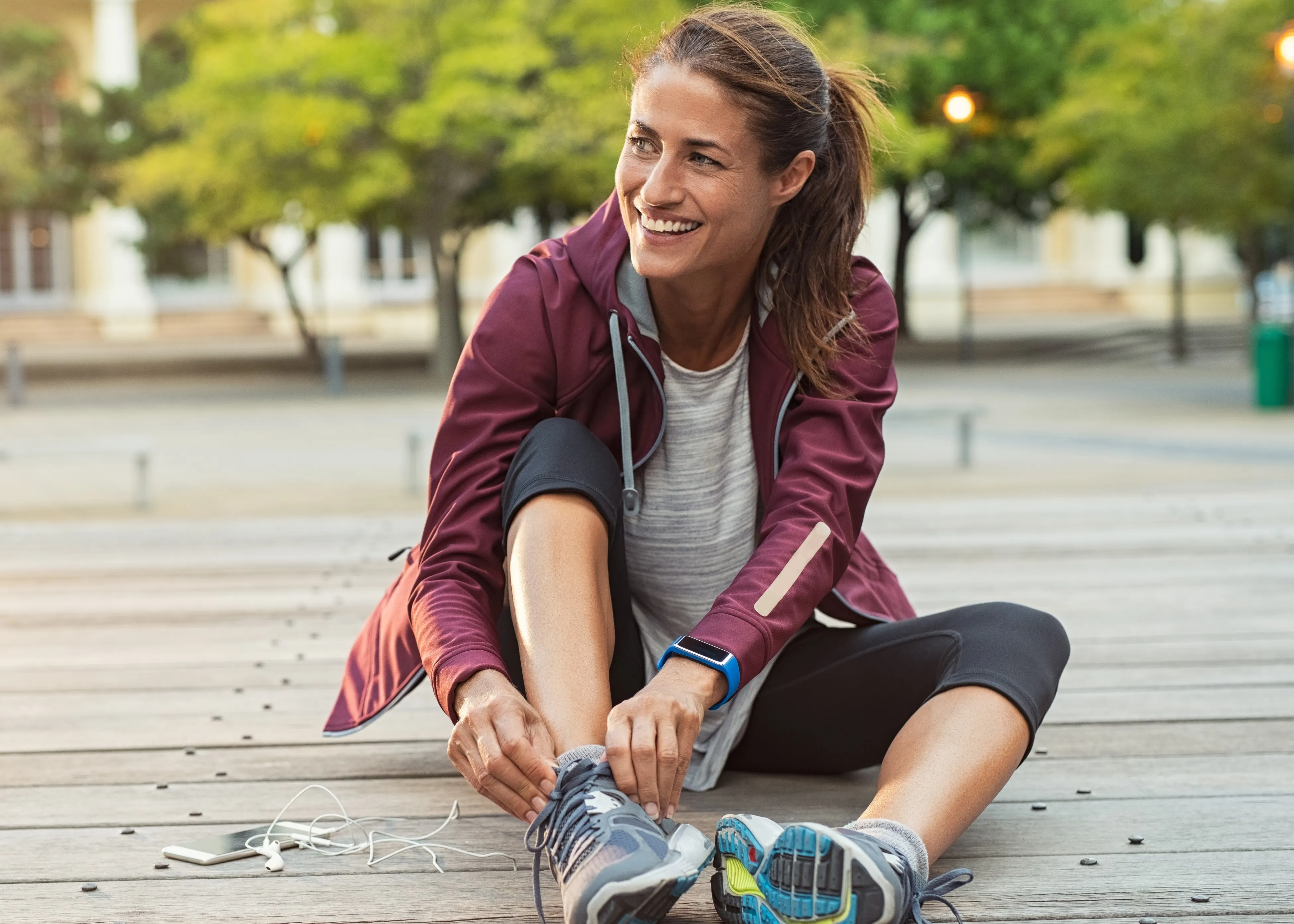 Woman tying her shoes