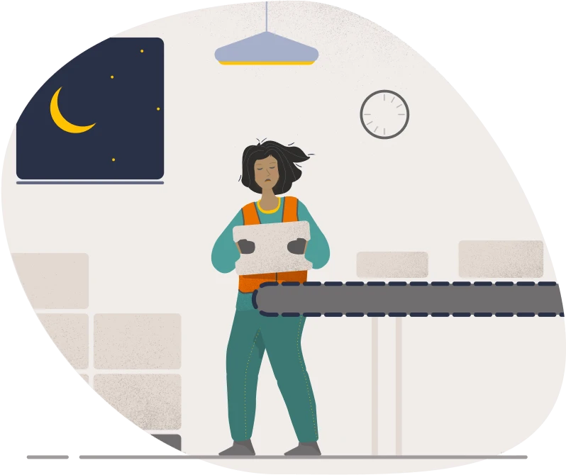 Night shift factory worker carrying a box at a conveyor belt
