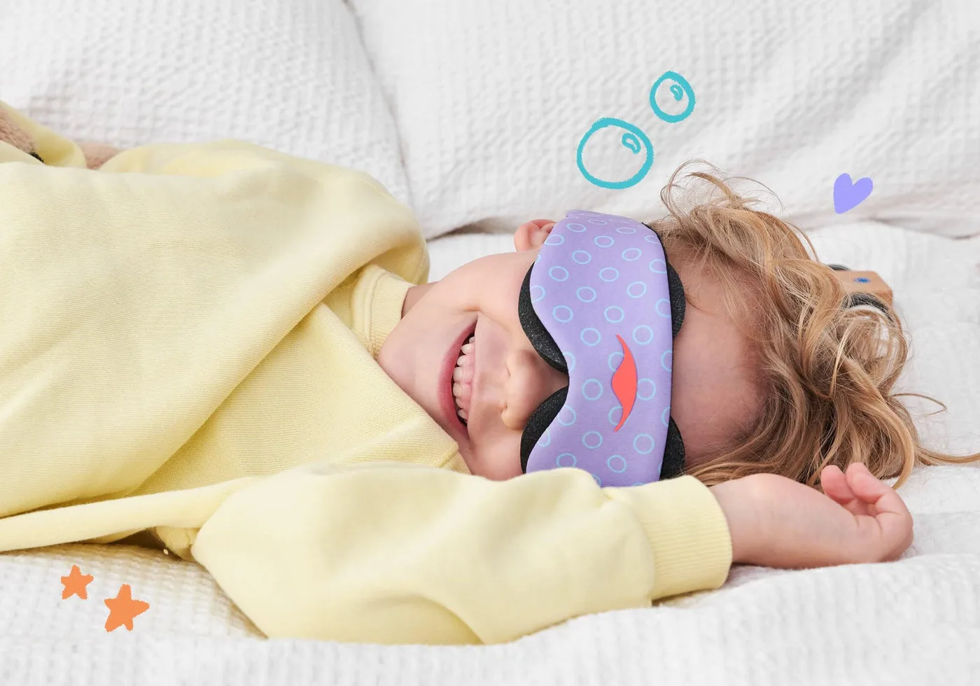 Child resting while wearing the Manta Kids Sleep Mask
